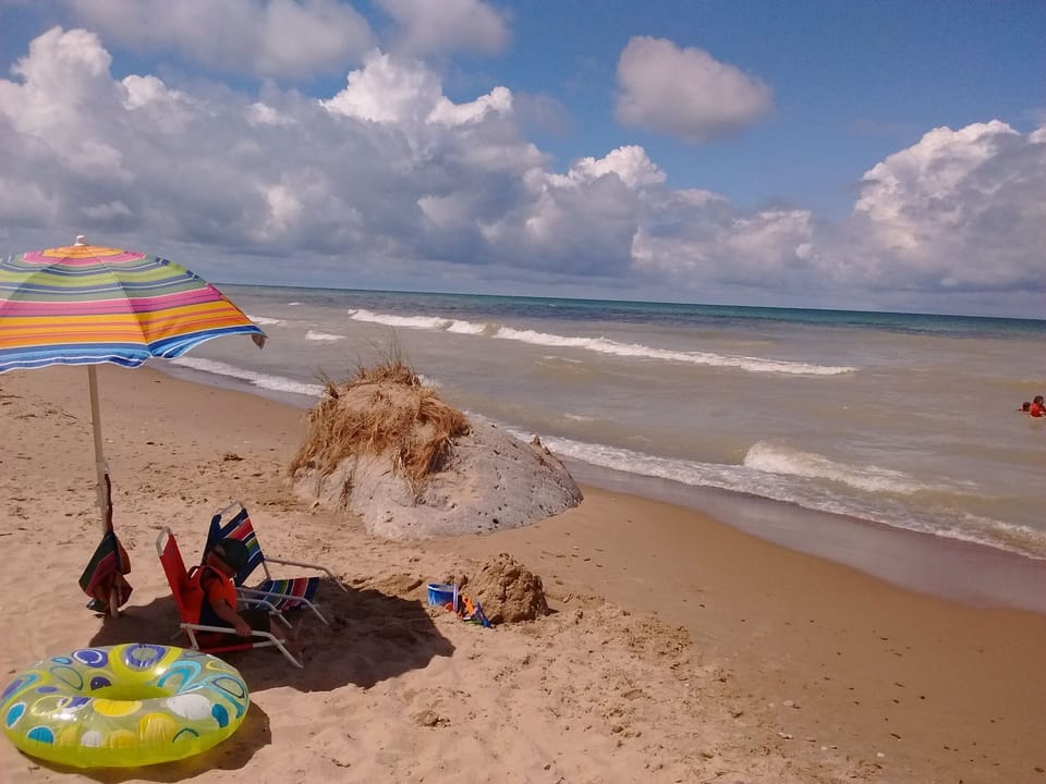 Have Fun Relaxing in the Sand and Playing at the Private Beach