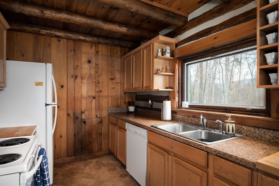 Kitchen with window to patio  