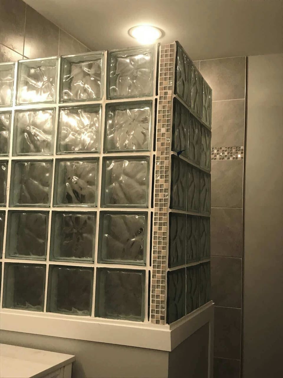 Master shower with glass block wall
