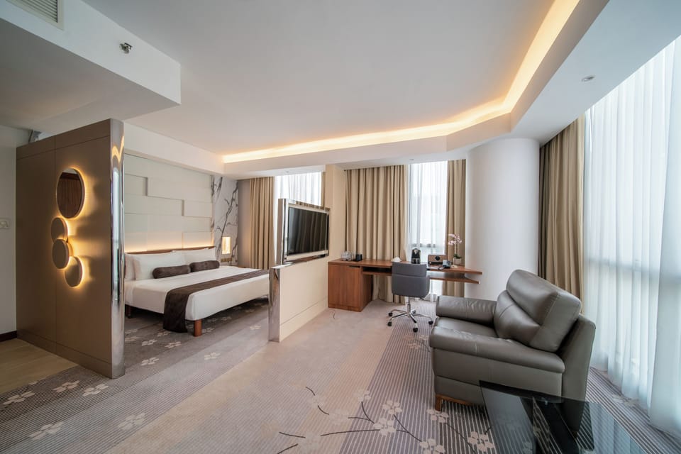 Premium bedding, down comforters, minibar, in-room safe