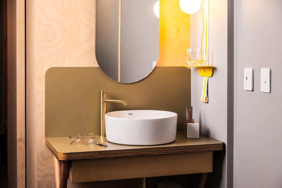 Shower, designer toiletries, towels