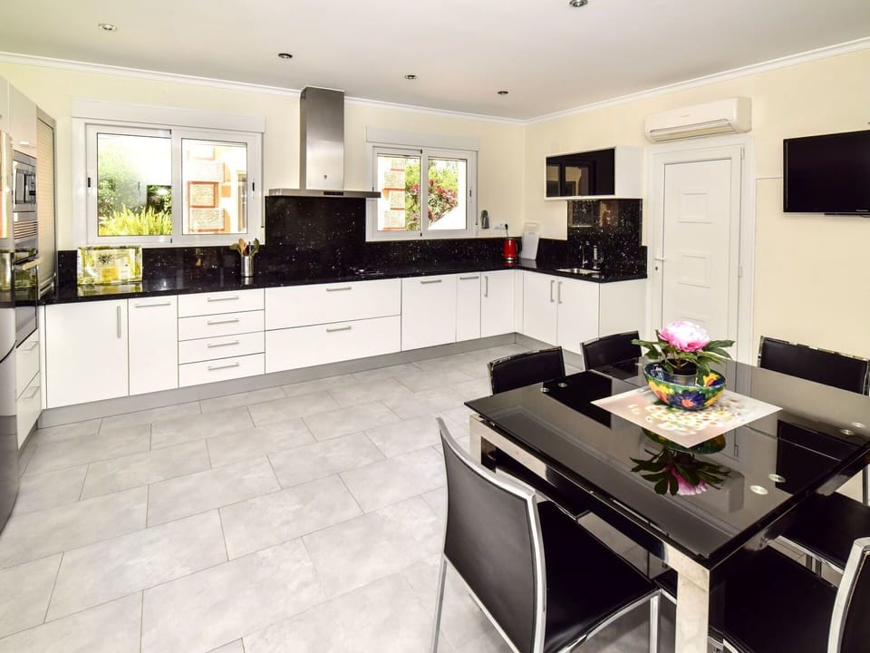 Room, Countertop, Property, Furniture, Kitchen, Interior Design, Cabinetry, Building, Floor, Tile