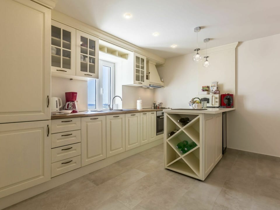 Cabinetry, Property, Countertop, Furniture, Drawer, Wood, Kitchen, Interior Design, Floor, Flooring