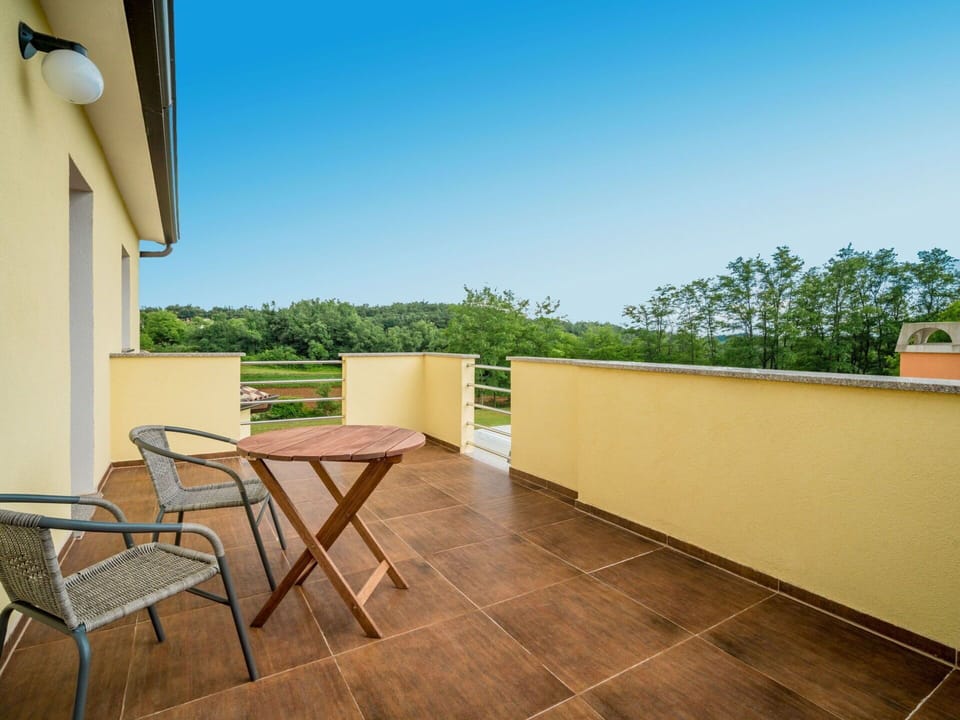 Sky, Furniture, Property, Azure, Chair, Table, Wood, Building, Shade, Flooring