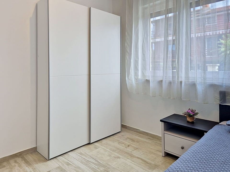 Flooring, Wood, Floor, Interior Design, Room, Apartment, Door, Furniture, Wardrobe, Cabinetry