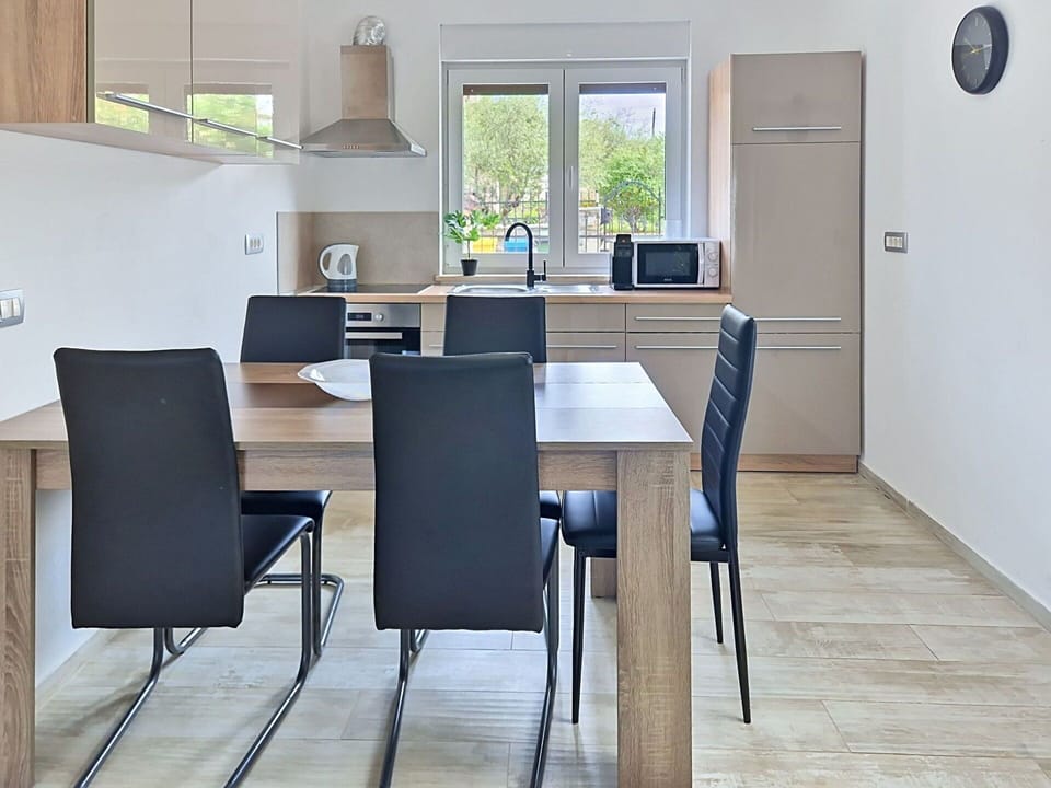 Furniture, Interior Design, Flooring, Floor, Table, Wood, Kitchen & Dining Room Table, Chair, Room, Wood Flooring