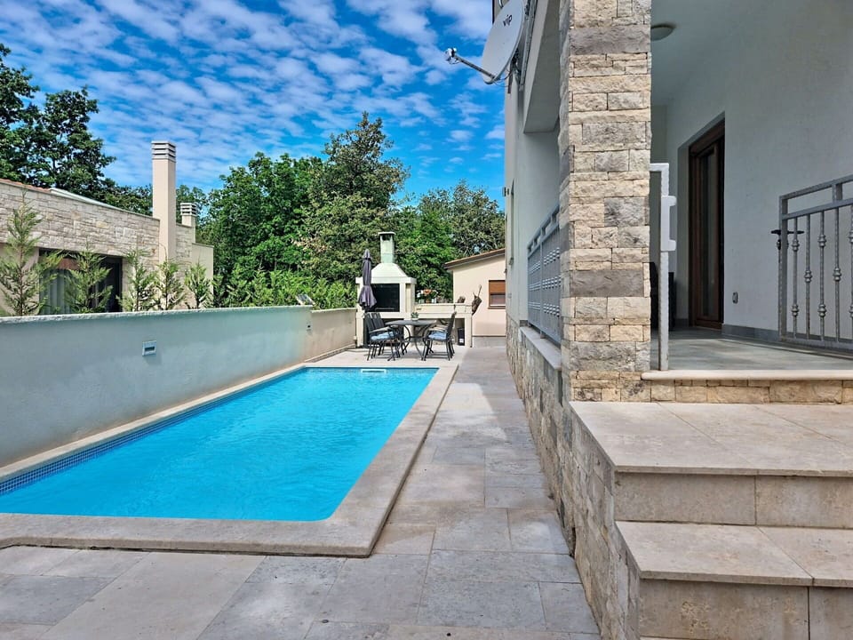 Swimming Pool, Composite Material, Concrete, Tile, Shade, Flagstone, Design, Water Feature, Outdoor Furniture, Villa