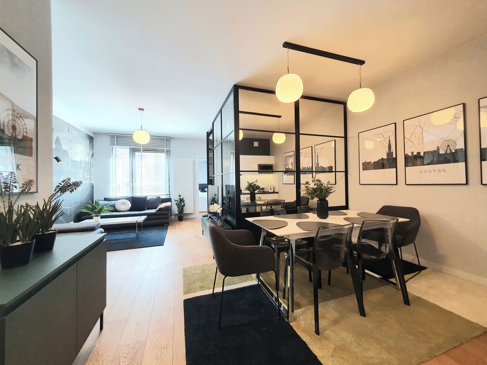 Deluxe Apartment, 1 Bedroom, City View | Living area | 50-inch flat-screen TV with cable channels, TV