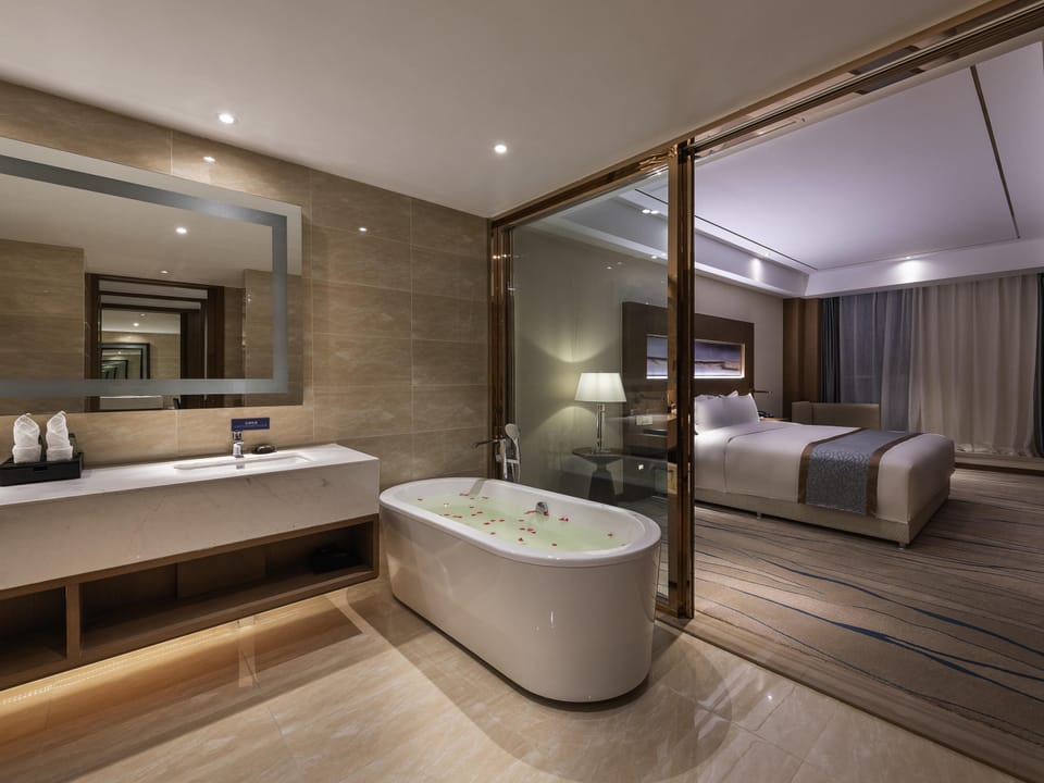Deluxe Suite, 1 King Bed | In-room safe, desk, soundproofing, iron/ironing board (on request)