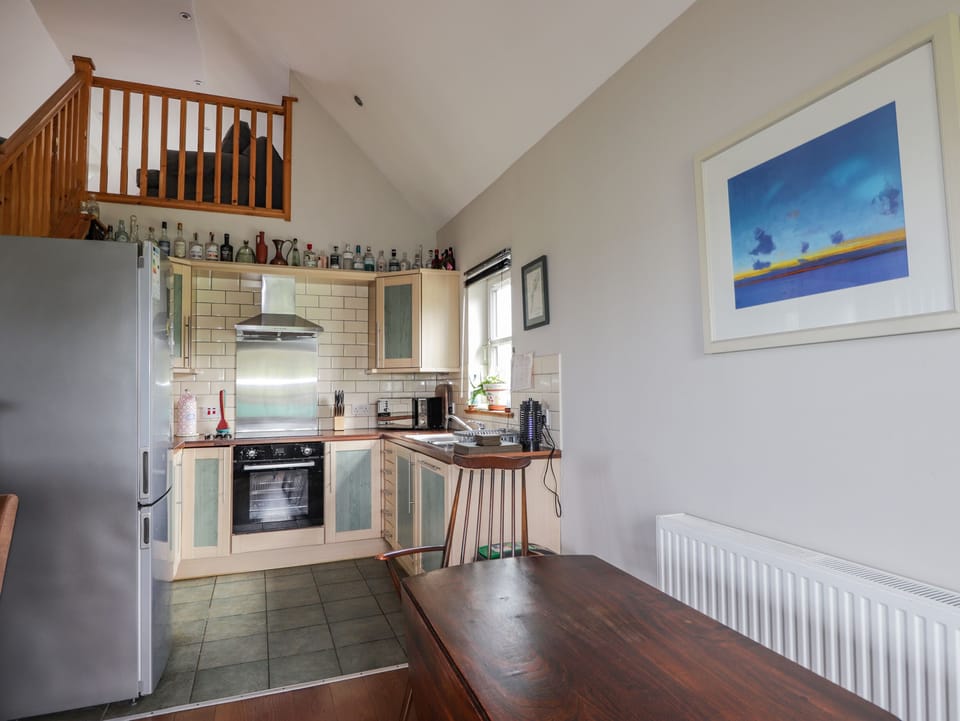 Cottage | Private kitchen | Stovetop, dishwasher, highchair, cookware/dishes/utensils