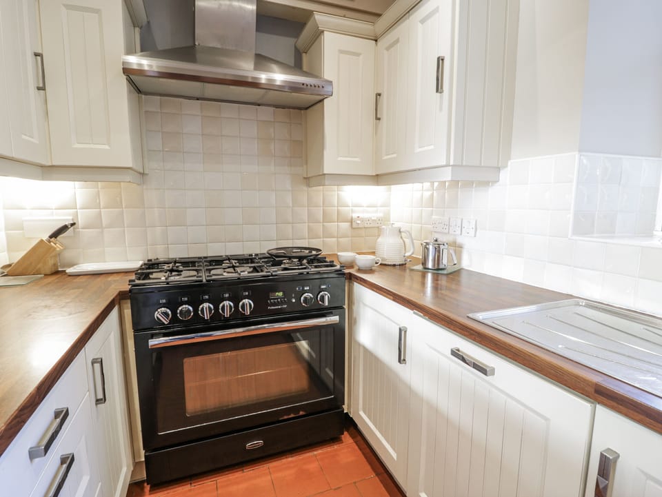 Dishwasher, highchair, cookware/dishes/utensils
