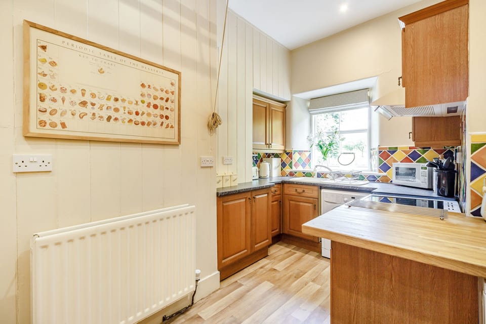 Cottage | Private kitchen | Stovetop, dishwasher, highchair, cookware/dishes/utensils