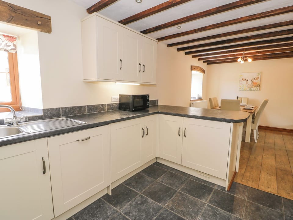 Cottage | Private kitchen | Dishwasher, highchair, cookware/dishes/utensils