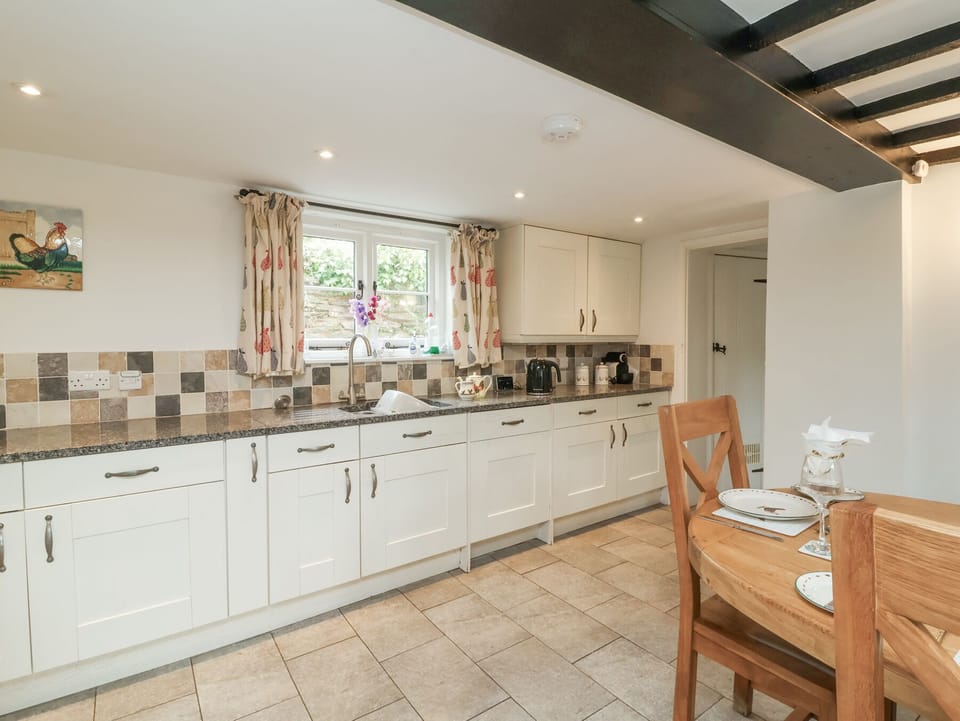 Cottage | Private kitchen | Stovetop, dishwasher, highchair, cookware/dishes/utensils