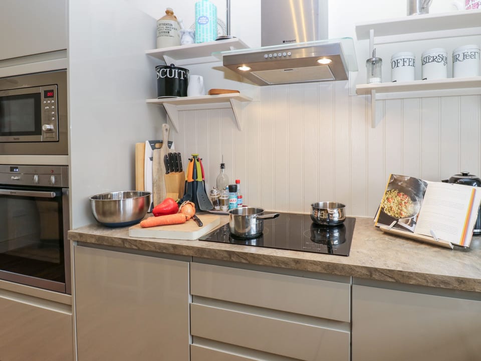 Dishwasher, highchair, cookware/dishes/utensils