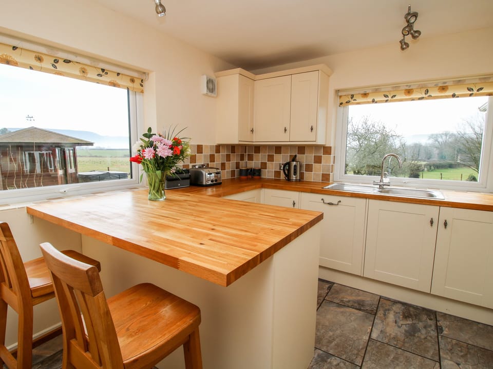 Cottage | Private kitchen | Stovetop, dishwasher, highchair, cookware/dishes/utensils
