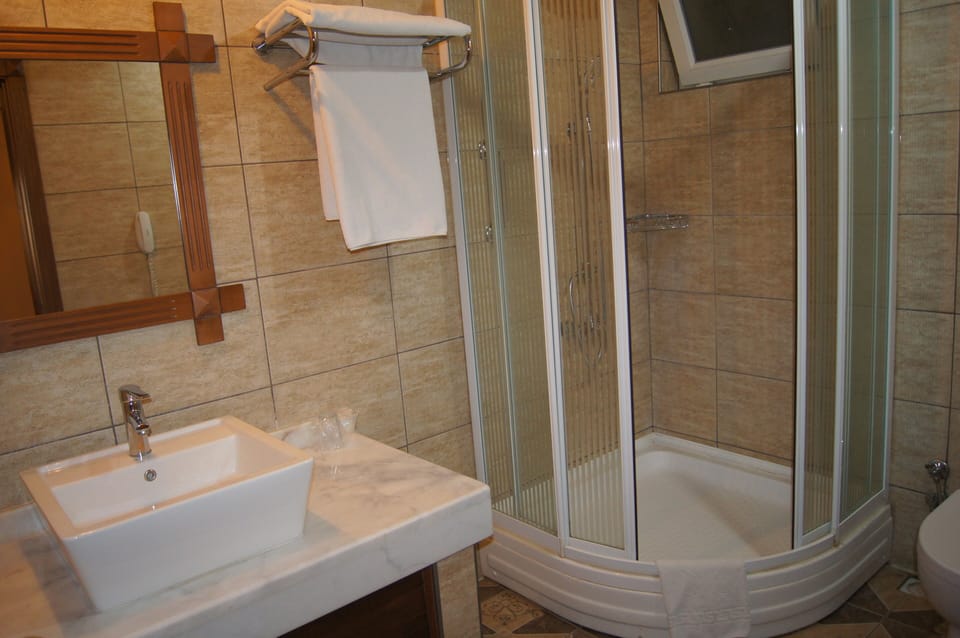 Rainfall showerhead, free toiletries, hair dryer, bathrobes