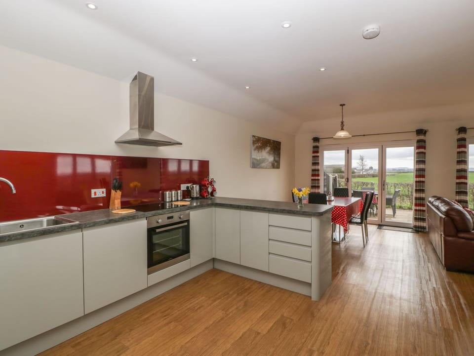 Cottage | Private kitchen | Microwave, stovetop, dishwasher, highchair