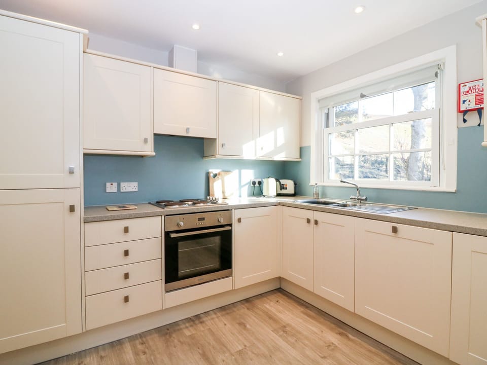 Cottage | Private kitchen | Stovetop, dishwasher, highchair, cookware/dishes/utensils