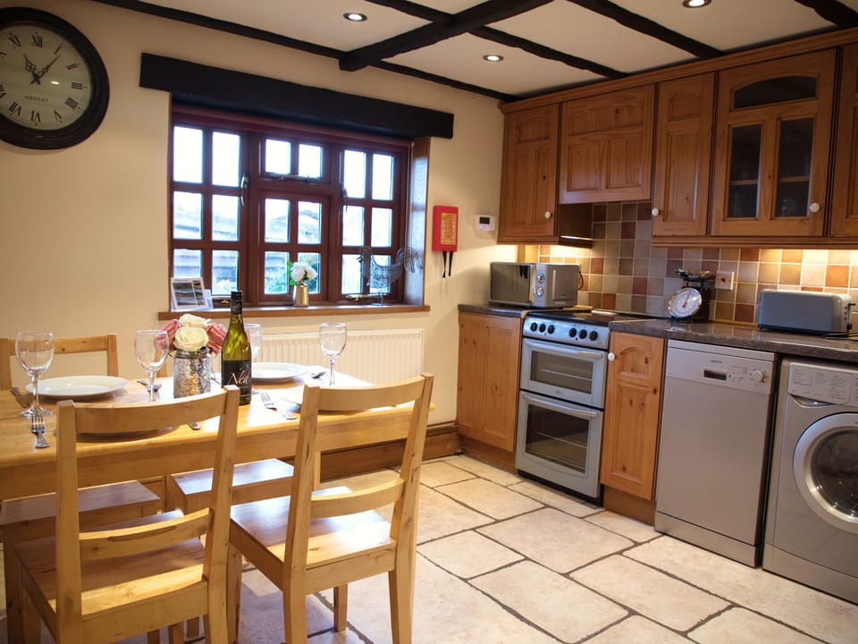 Cottage | Private kitchen | Stovetop, dishwasher, highchair, cookware/dishes/utensils