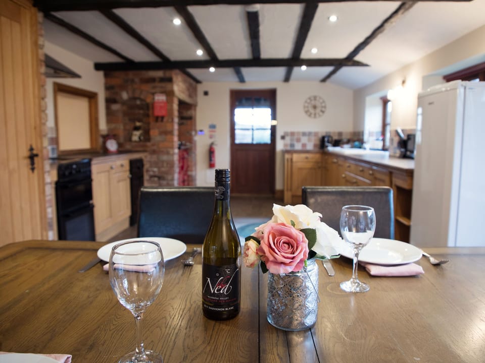 Cottage | Private kitchen | Stovetop, dishwasher, highchair, cookware/dishes/utensils