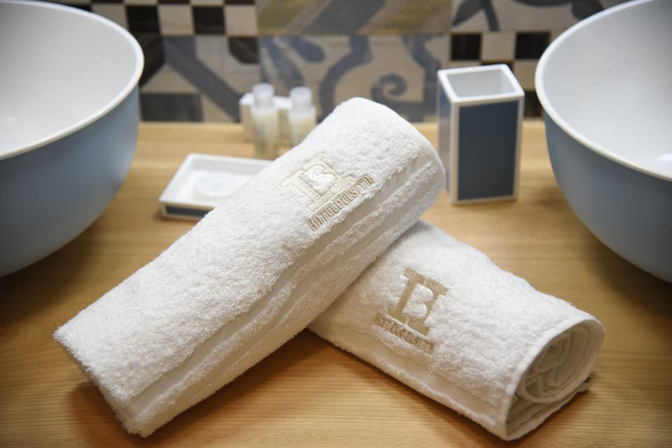 Standard Quadruple Room | Bathroom amenities | Shower, rainfall showerhead, hair dryer, slippers