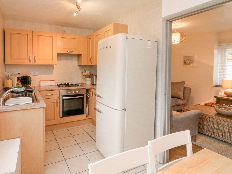 Cottage | Private kitchen | Fridge, microwave, stovetop, dishwasher