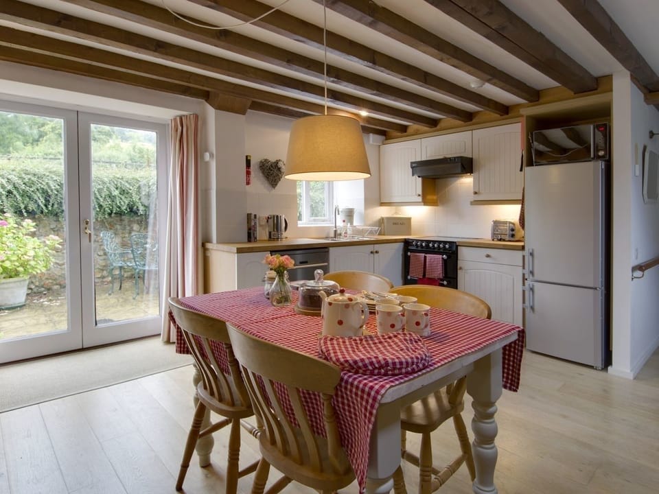 Cottage | Private kitchen | Dishwasher, highchair, cookware/dishes/utensils