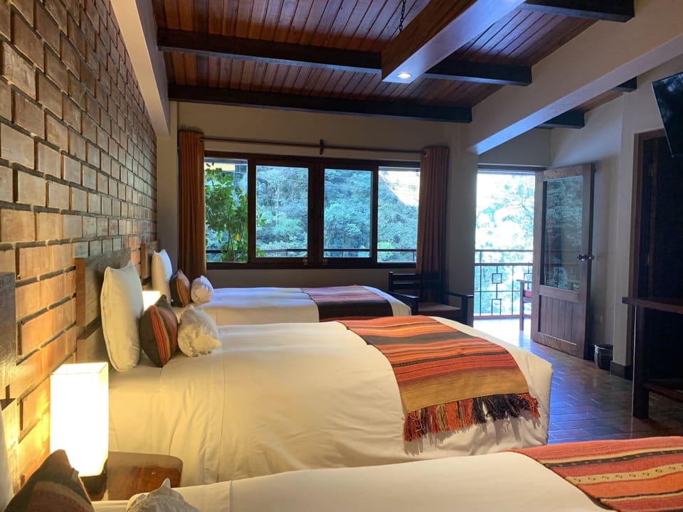 Triple Room, Terrace, River View | In-room safe, WiFi (free), bed sheets