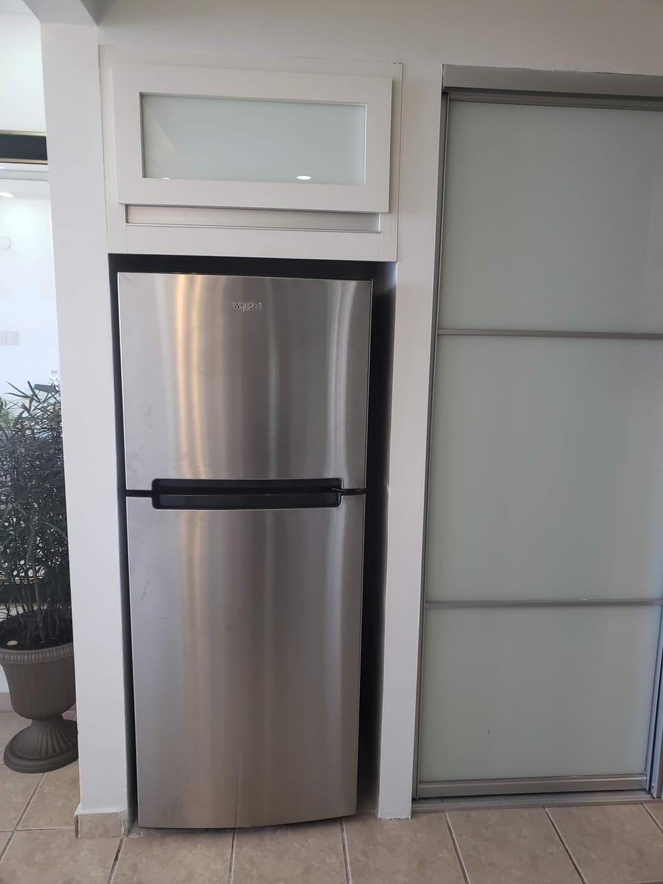 Stainless steel refrigerator and freezer.