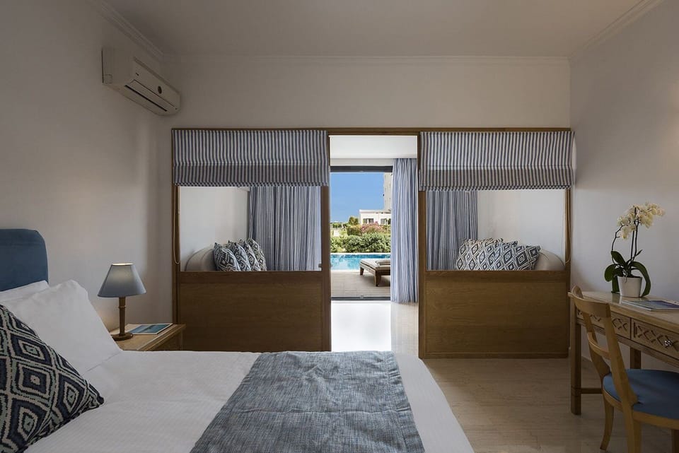 Family Room, Private Pool | Minibar, in-room safe, desk, soundproofing