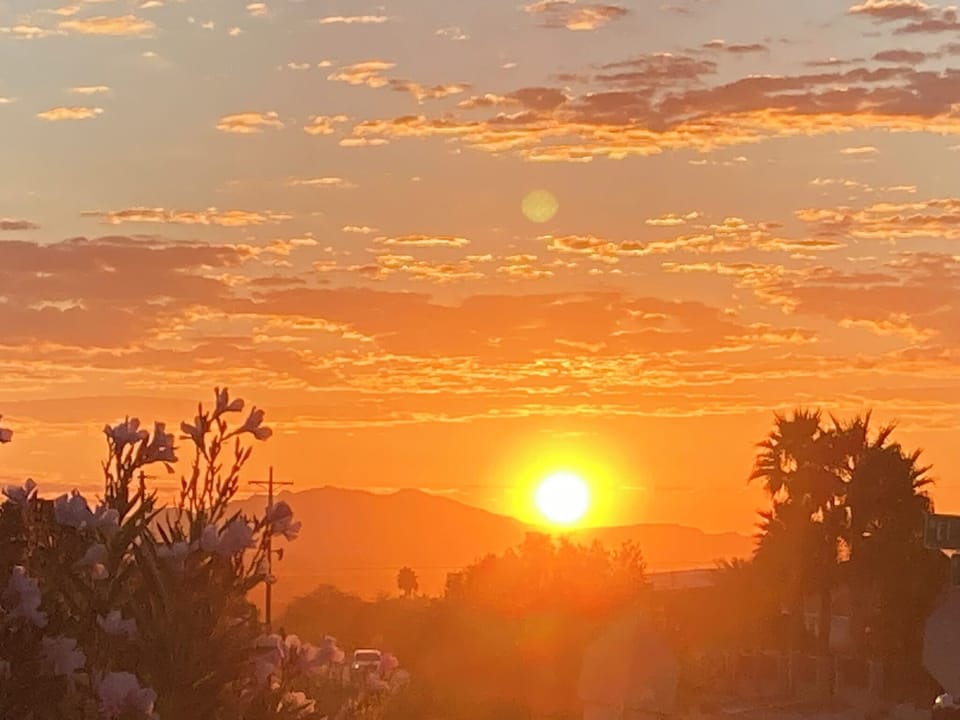 Rising sun over Sheep Range Mtns