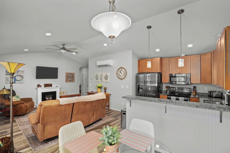 Upper Level Living Area, Kitchen and Dining Table