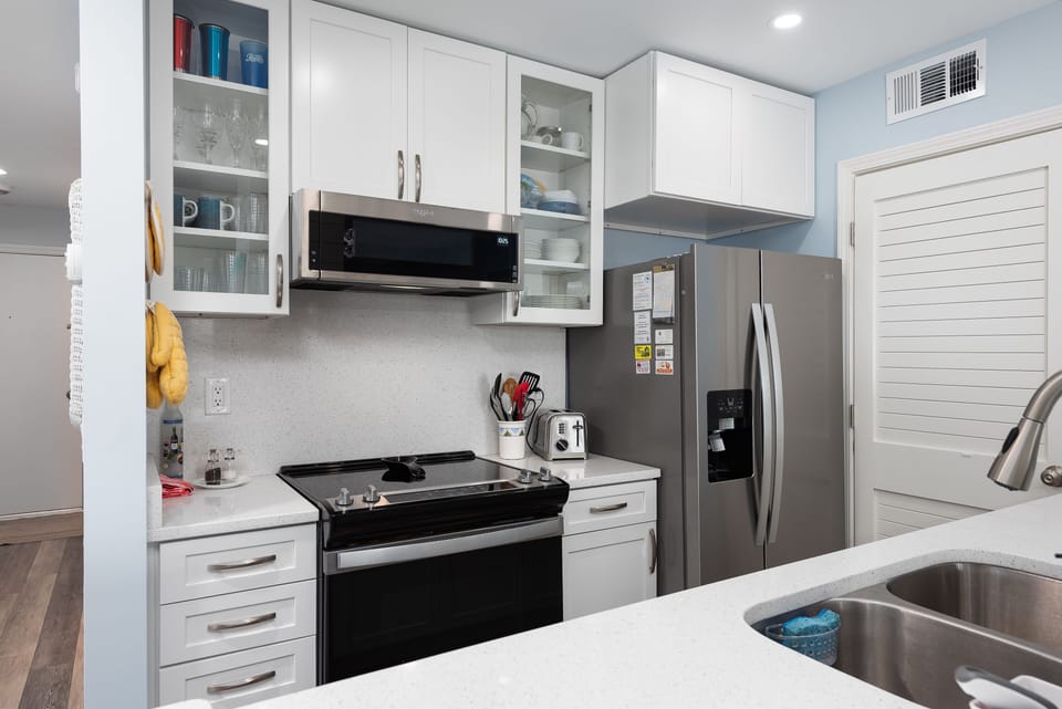 Well equipped kitchen with stainless steel appliances