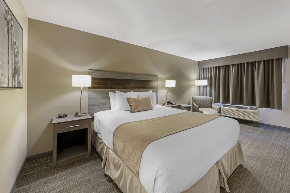 Premium bedding, blackout drapes, iron/ironing board