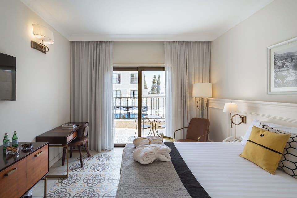 Deluxe Room, Balcony, Pool View | Premium bedding, in-room safe, desk, soundproofing