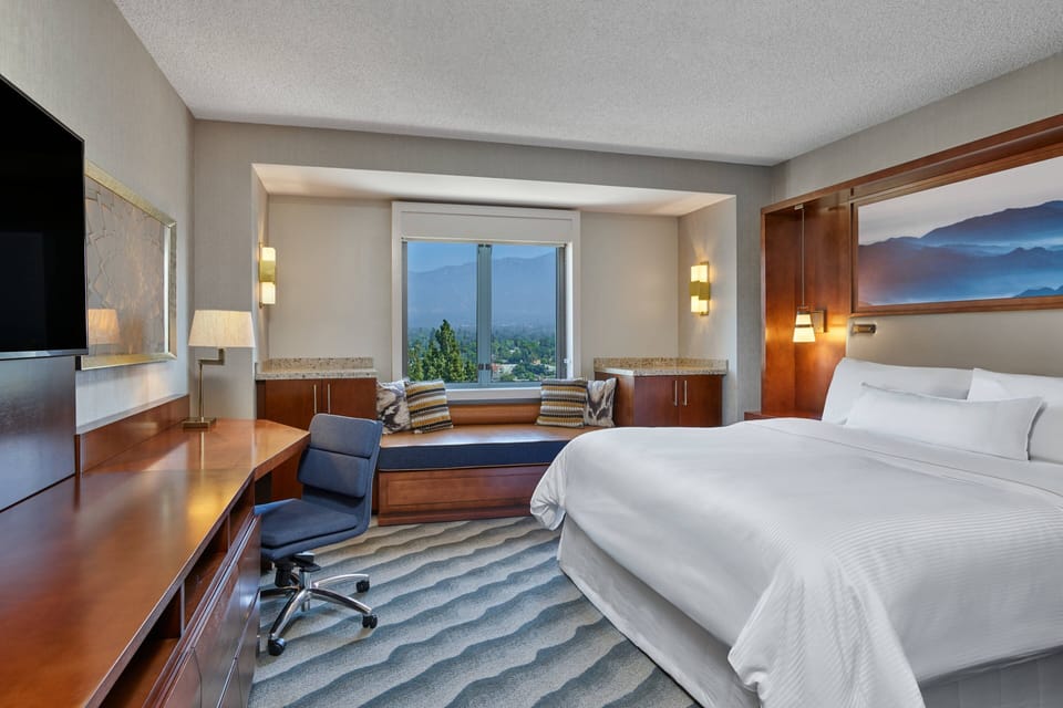 Premium bedding, down comforters, pillowtop beds, in-room safe