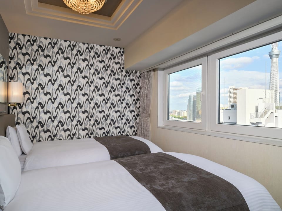 Deluxe Twin Room, 2 Bedrooms, Non Smoking | Premium bedding, down comforters, desk, laptop workspace