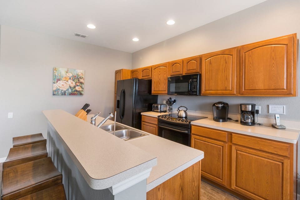A fully equipped kitchen to prepare meals for all with breakfast seating for 4