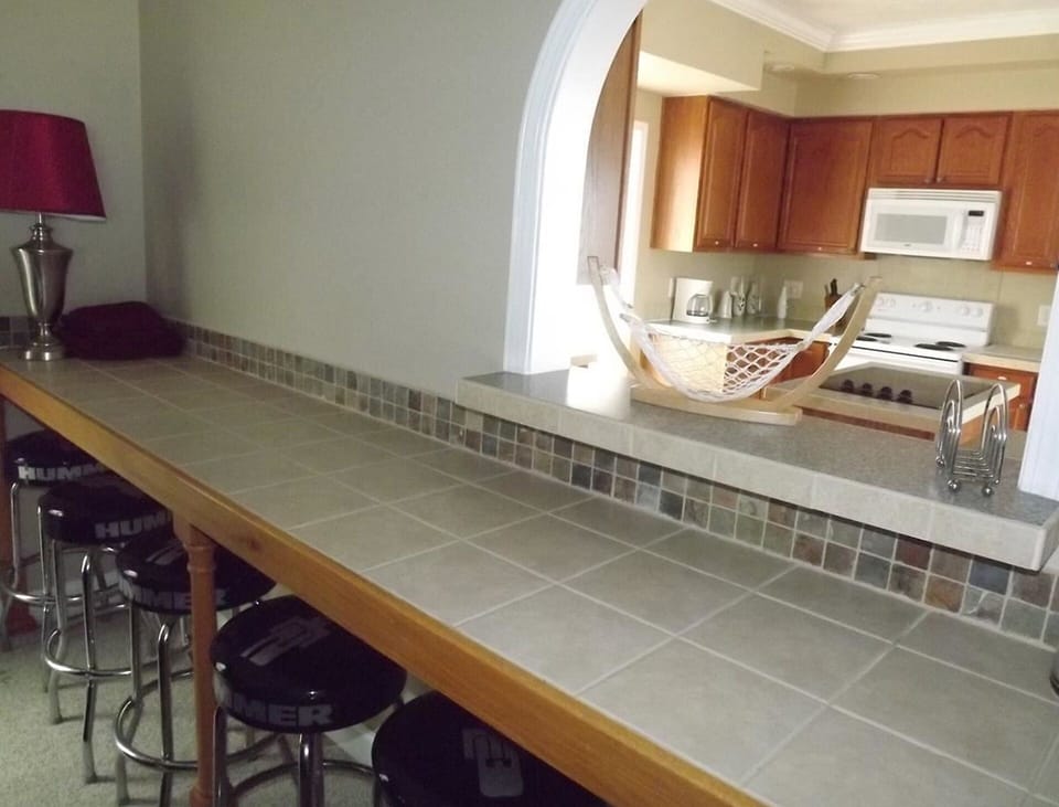 Counter seating for 6, in addition to dining table &  outdoor seating.