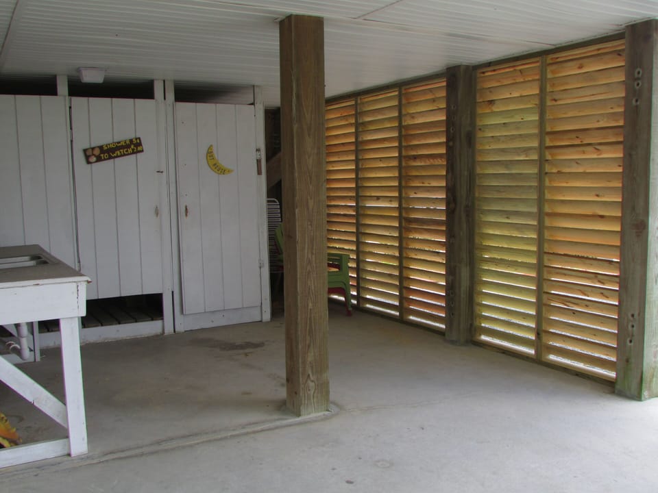 Enclosed outdoor hot/cold shower, bathroom. Also outdoor sink/ cleaning station