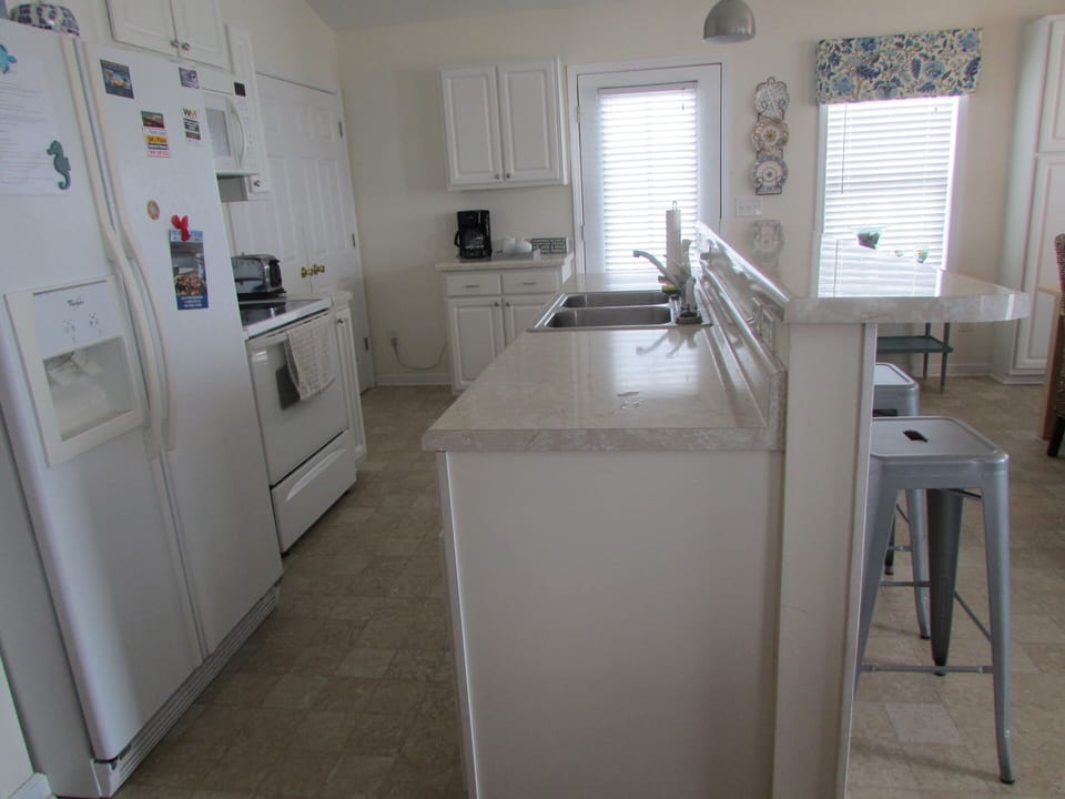 Kitchen fully stocked with everything you need.