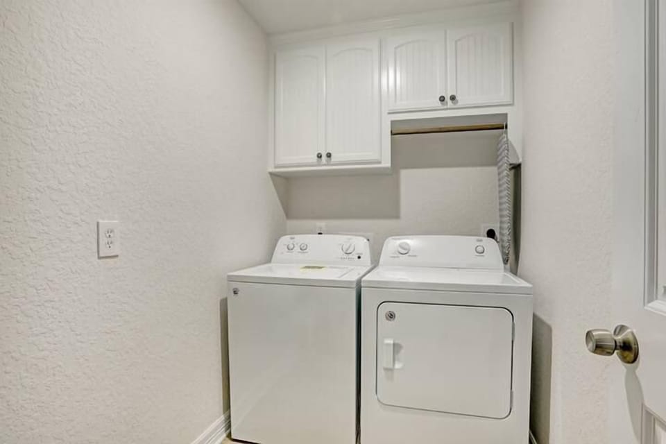 Full size washer and dryer on first floor.