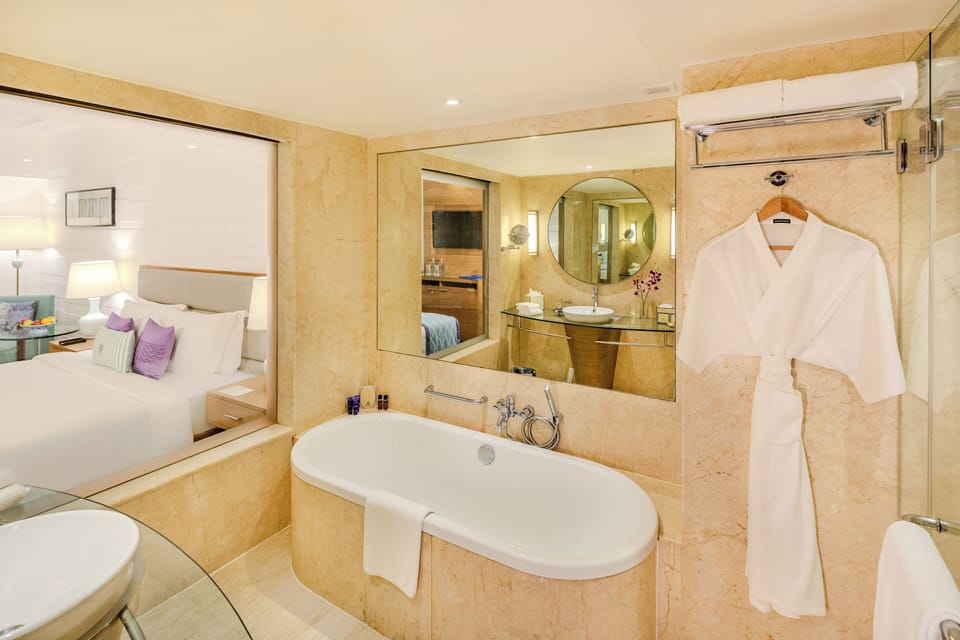 Separate tub and shower, rainfall showerhead, free toiletries