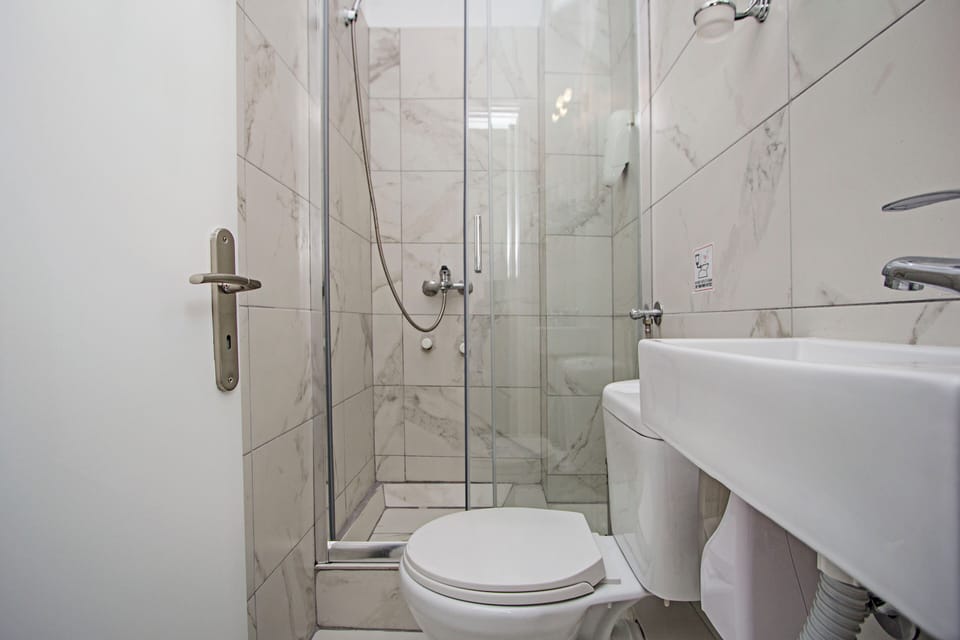 Shower, free toiletries, hair dryer, slippers