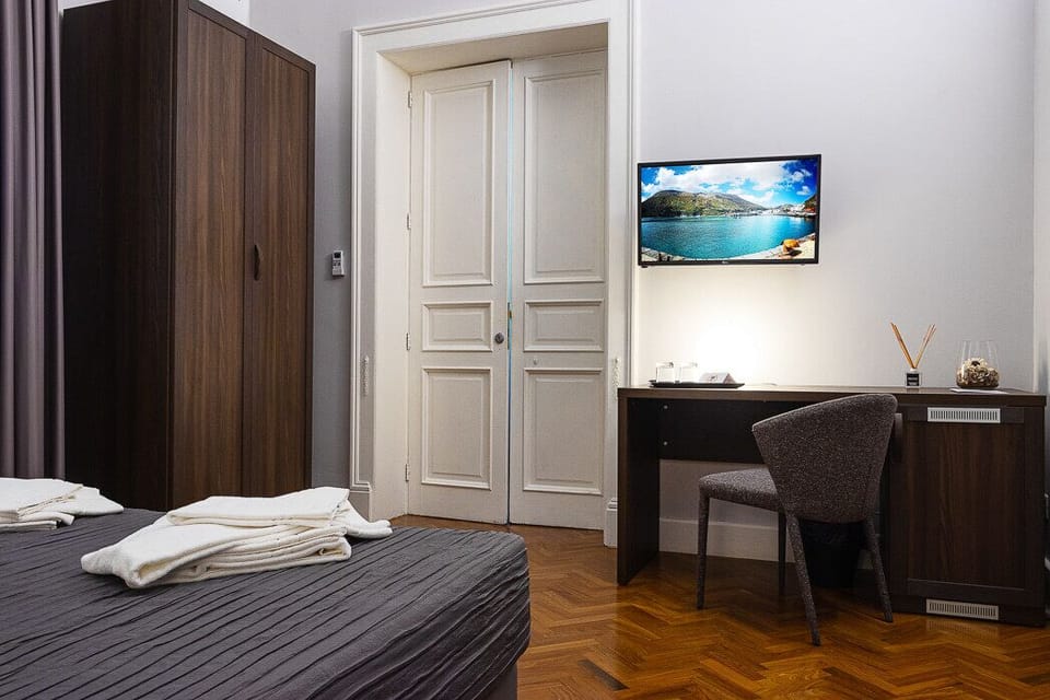 Deluxe Double Room, Multiple Beds, Non Smoking | Premium bedding, minibar, in-room safe, desk