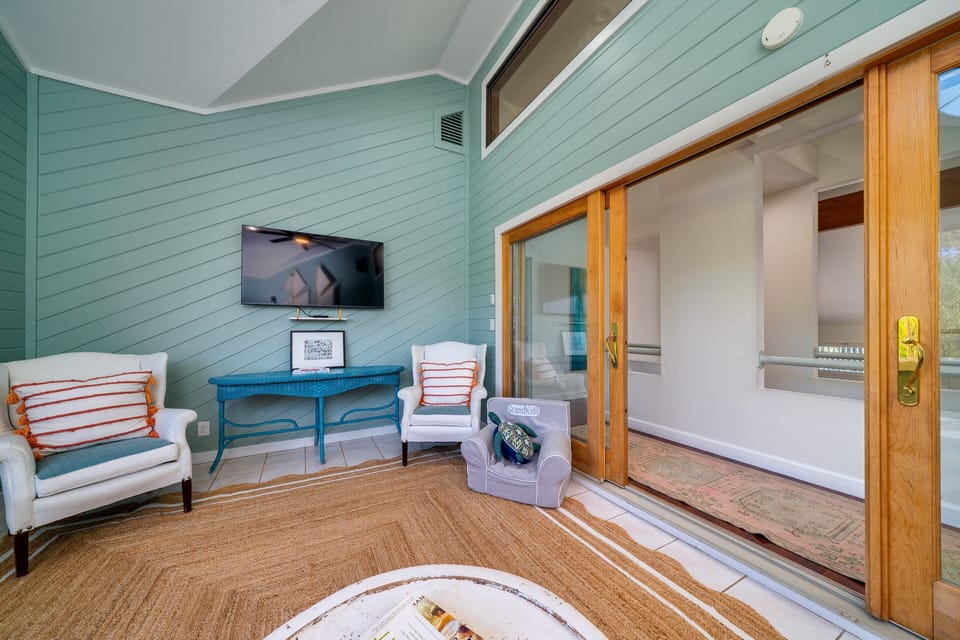 The second floor has a family room, the primary en-suite, a guest bedroom and hall bath.