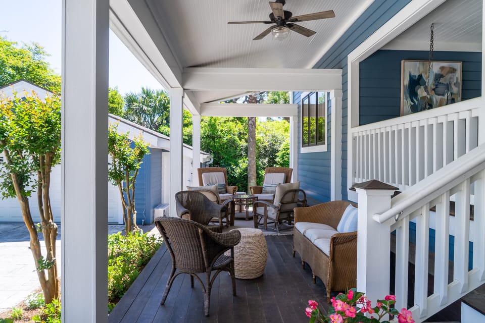 The curb appeal for this lovely home is wonderful!  Front porch steps drop you off onto two landings.