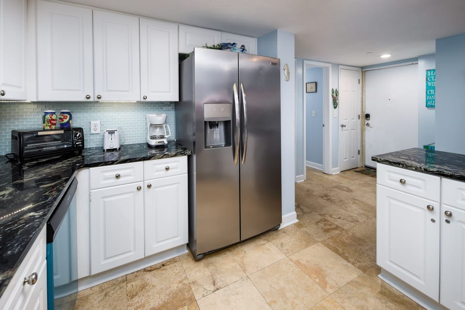 Kitchen and front entry way