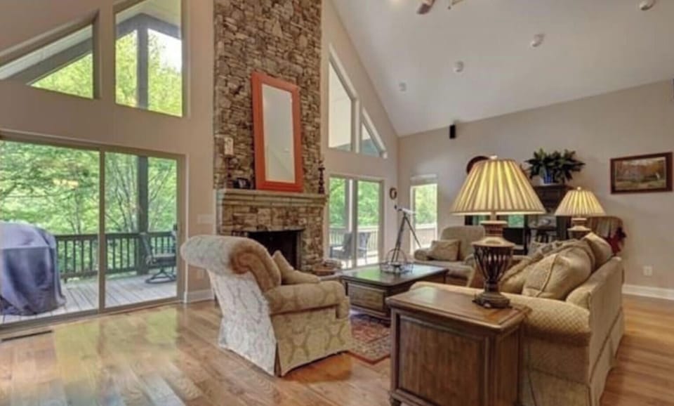 Large great room with remote start fireplace.  Beautiful views and balcony.